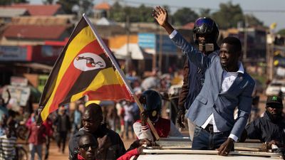 ​Bobi Wine parades through crowds of people in Kayunga District on December 01, 2020 in Jinja, Uganda. Presidential candidates are campaigning in Uganda ahead of the elections scheduled for the 14 January 2021.