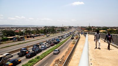 Cars line up in the direction of the Madina Market in Accra after the lockdown announcement on March 28, 2020.