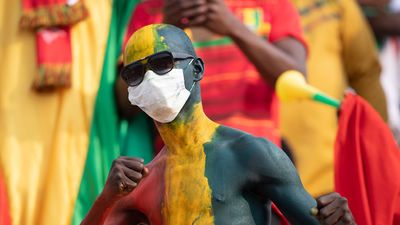 Colourful Guinea fans during the Group B Africa Cup of Nations (CAN) 2021 match between Zimbabwe and Guinea at Stade Ahmadou Ahidjo in Yaounde on January 18, 2022. 