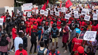 Ghanaians march during the ‘Ku Me Preko’ demonstration on November 5, 2022, in Accra, Ghana. People took to the streets of Ghana's capital to protest against the soaring cost of living, aggravated since the Russian invasion of Ukraine.