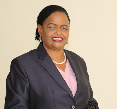 Kenya's Martha Koome, a top Chief Justice candidate, dressed in a black suit and pink blouse.