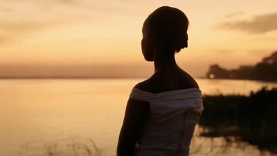 Woman looking into the sunset from Lingui: Les Liens Sacrés 