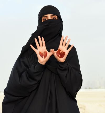 An image of a woman in a hijab taken by photographer Mous Lamrabat.