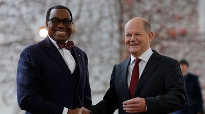 President of the African Development Bank Akinwumi Adesina (L) is welcomed by German Chancellor Olaf Scholz at the Chancellery in Berlin on November 20, 2023, as he arrives to attend the G20 Compact with Africa conference.
