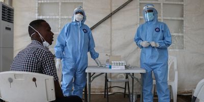 Staff members of the Ministry of Health prepare to take samples for testing for the COVID-19 coronavirus at the testing unit at the Bouffard hospital in Djibouti. 