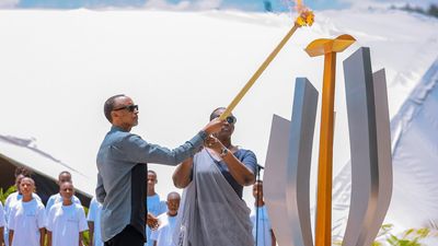 Rwandan President Paul Kagame and first lady Jeannette Kagame light the flame of remembrance during the commemoration of the 29th anniversary of the 1994 genocide against Tutsis at the Kigali Genocide Memorial in Kigali, Rwanda, April 7, 2023.