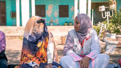 Salma Salah (right) meets with women across Sudan to help them educate and connect women to care.