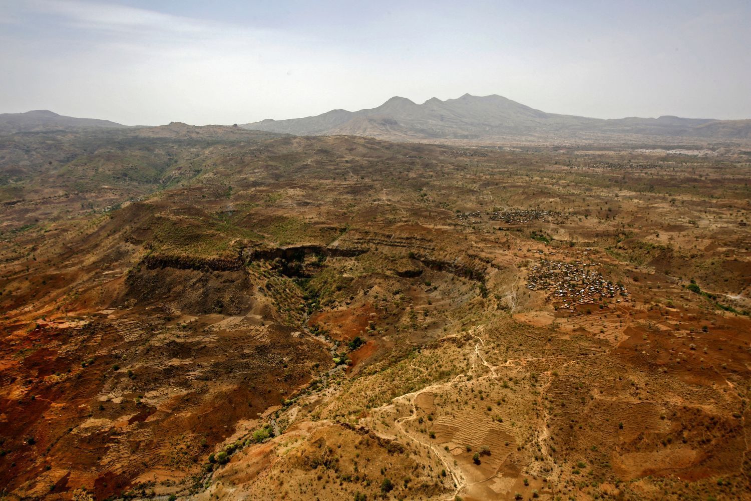 An aerial view of the thickly forested mountainous area of Jebel Marra in central Darfur