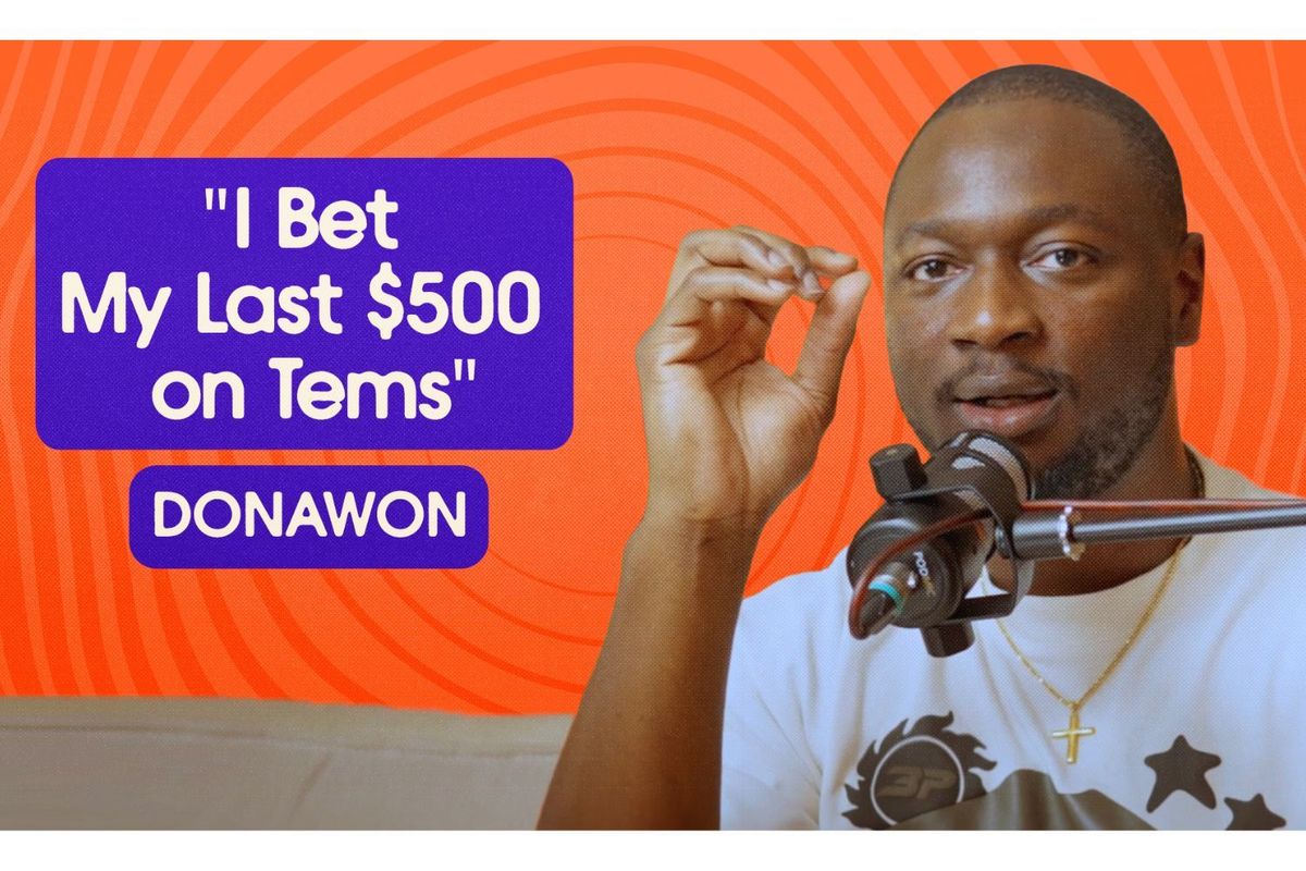 Muyiwa Awoniyi sits in front of a microphone, gesturing with his hand as he speaks, with text beside him reading “I Bet My Last $500 on Tems.”
