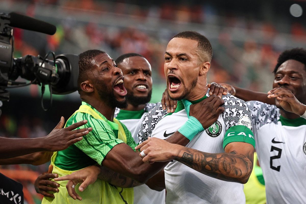 Nigeria's defender #5 William Troost-Ekong (C) celebrates after shooting a penalty and scoring his team's first goal during the Africa Cup of Nations (CAN) 2024 group A football match between Ivory Coast and Nigeria at the Alassane Ouattara Olympic Stadium in Ebimpe, Abidjan, on January 18, 2024.