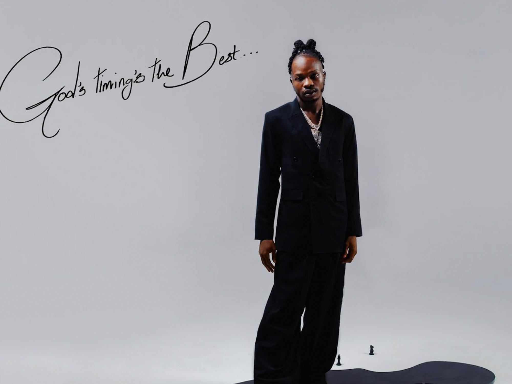 <div>Naira Marley Marks His Debut Album By Reminding Us That 'God's Timing's The Best'</div>