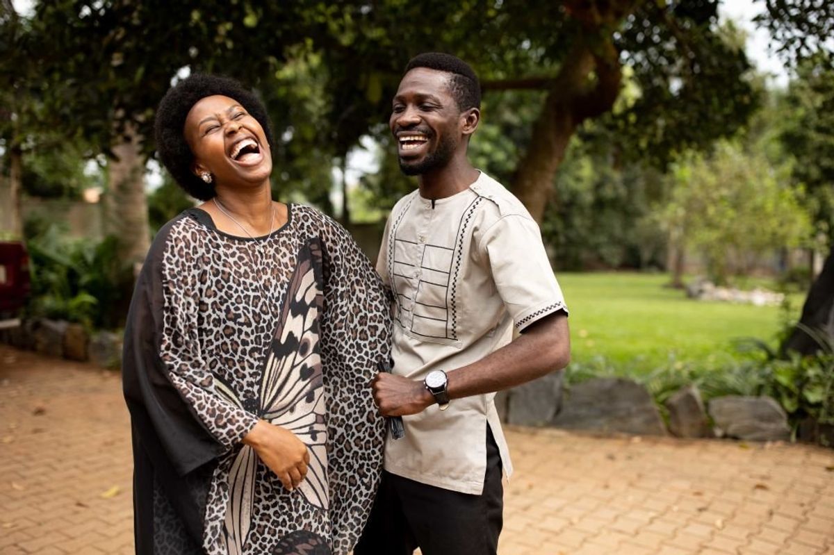 Opposition candidate, Bobi Wine and wife Barbara Itungo Kyagulanyi laugh during the Ugandan presidential elections on January 14, 2021 in Kampala, Uganda.