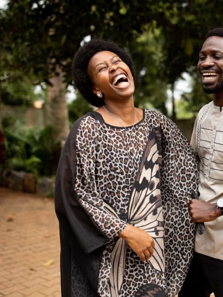 Opposition candidate, Bobi Wine and wife Barbara Itungo Kyagulanyi laugh during the Ugandan presidential elections on January 14, 2021 in Kampala, Uganda.