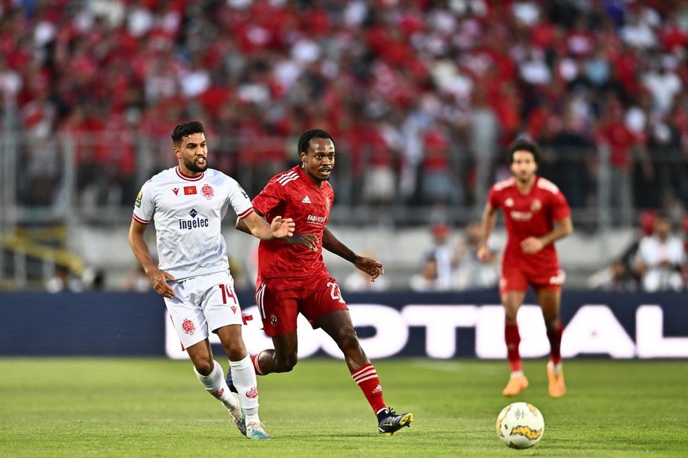 Percy Tau of Al Ahly SC and Yahia Attiyat Allah of Wydad AC during the CAF Champions League Final match between Wydad AC and Al Ahly SC at Stade Mohamed V on June 11, 2023 in Casablanca, Morocco.