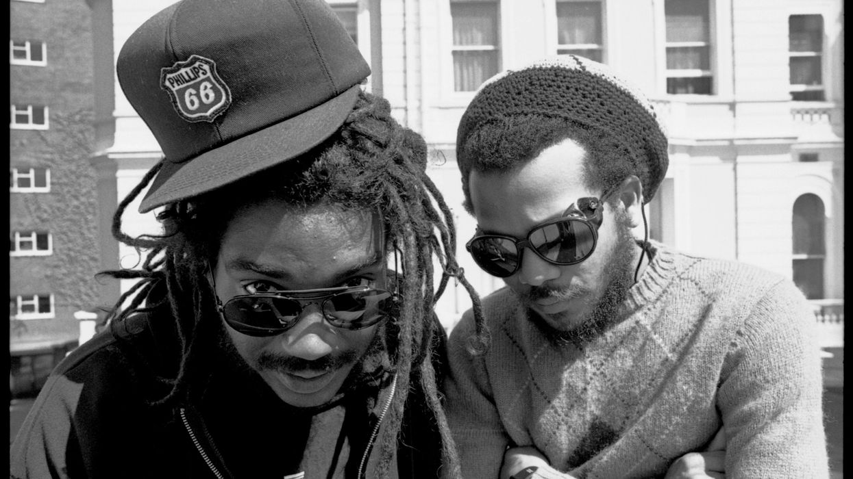 https://www.okayafrica.com/media-library/photo-of-pioneering-black-punk-band-bad-brains-with-dreads-and-baseball-cap-in-london-in-black-and-white.jpg?id=22873344&width=1245&height=700&quality=85&coordinates=0%2C259%2C0%2C259