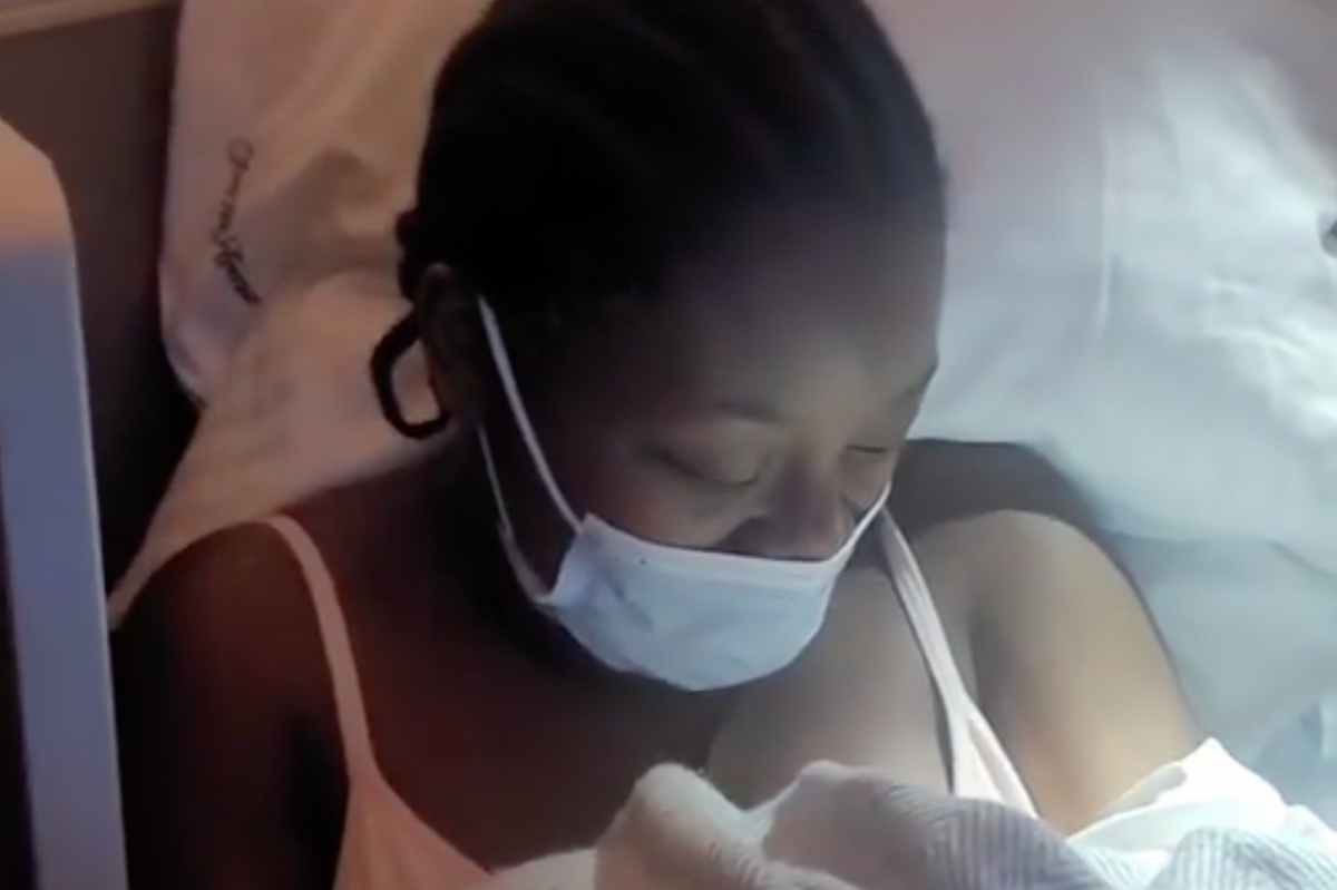 Pictured: A Ghanaian woman gives birth 34,000 while on a flight from Accra, Ghana to Washington, DC, USA. 