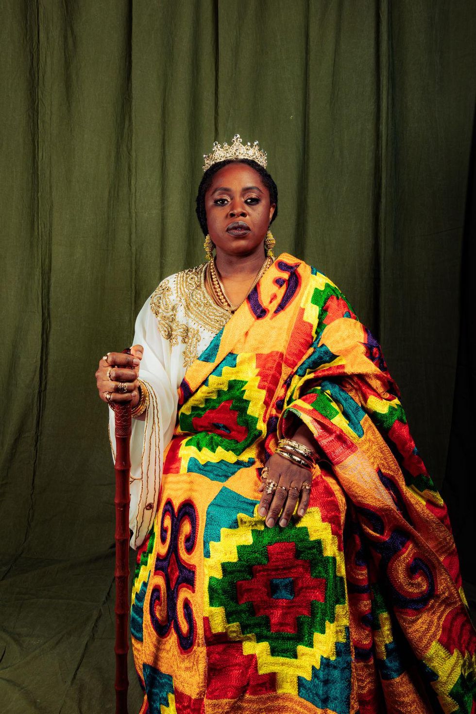Pictured: Nigerian artist Tosinger as Queen Idia as part of her #We3Queens human art installation project