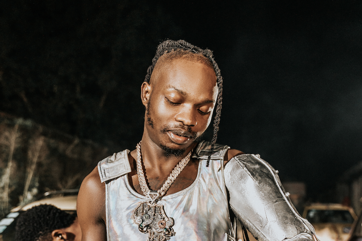 Pictured: Nigerian rapper Naira Marley in a BTS shot from his latest music video for single "Kojosese"