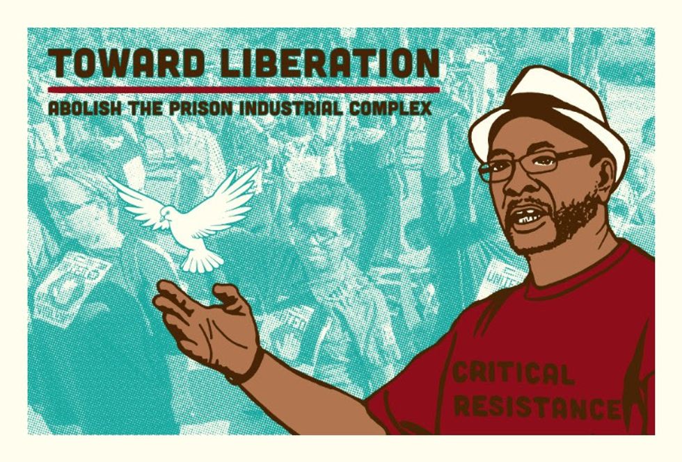 Protest sign saying abolish the prison industrial complex. From toward liberation.
