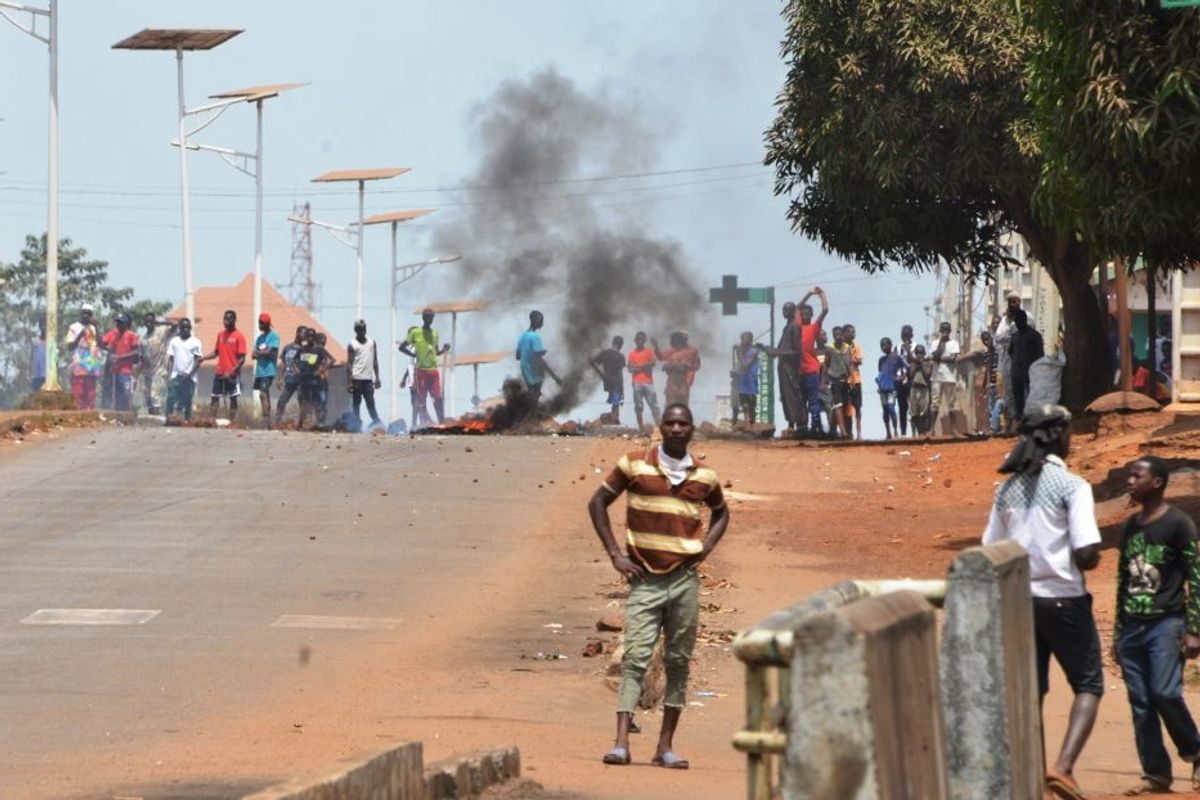 ​Protesters in Guinea clash with protesters over COVID-19 measures.
