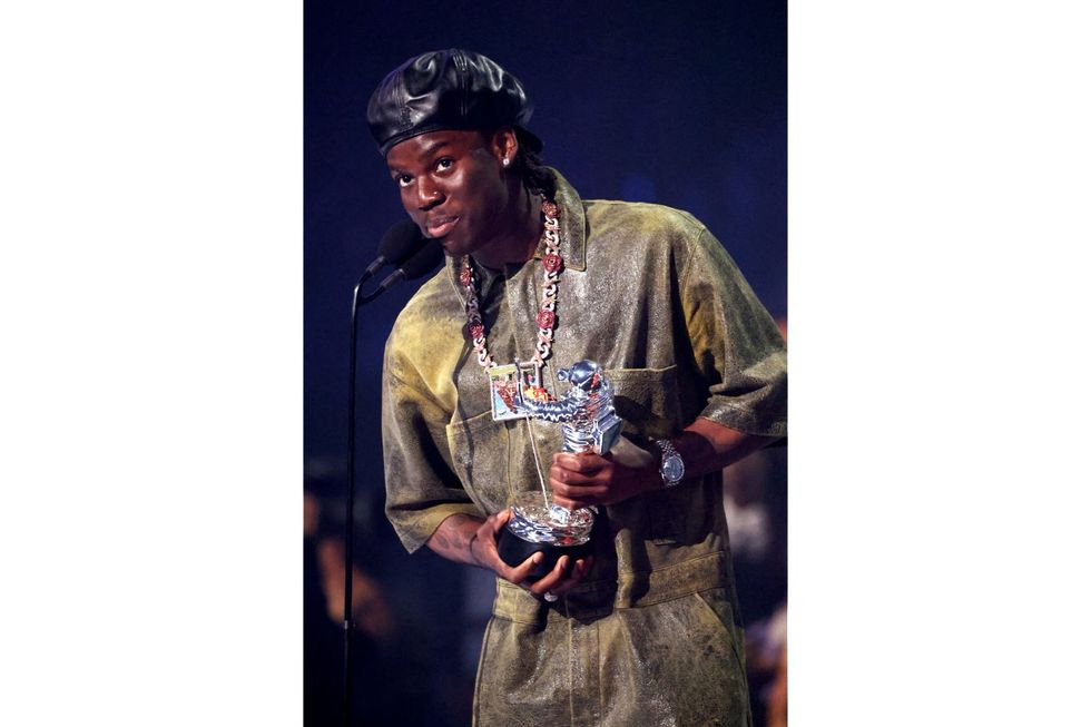 Rema accepts the Best Afrobeats award for "Calm Down" onstage during the 2023 MTV Video Music Awards at Prudential Center on September 12, 2023 in Newark, New Jersey.