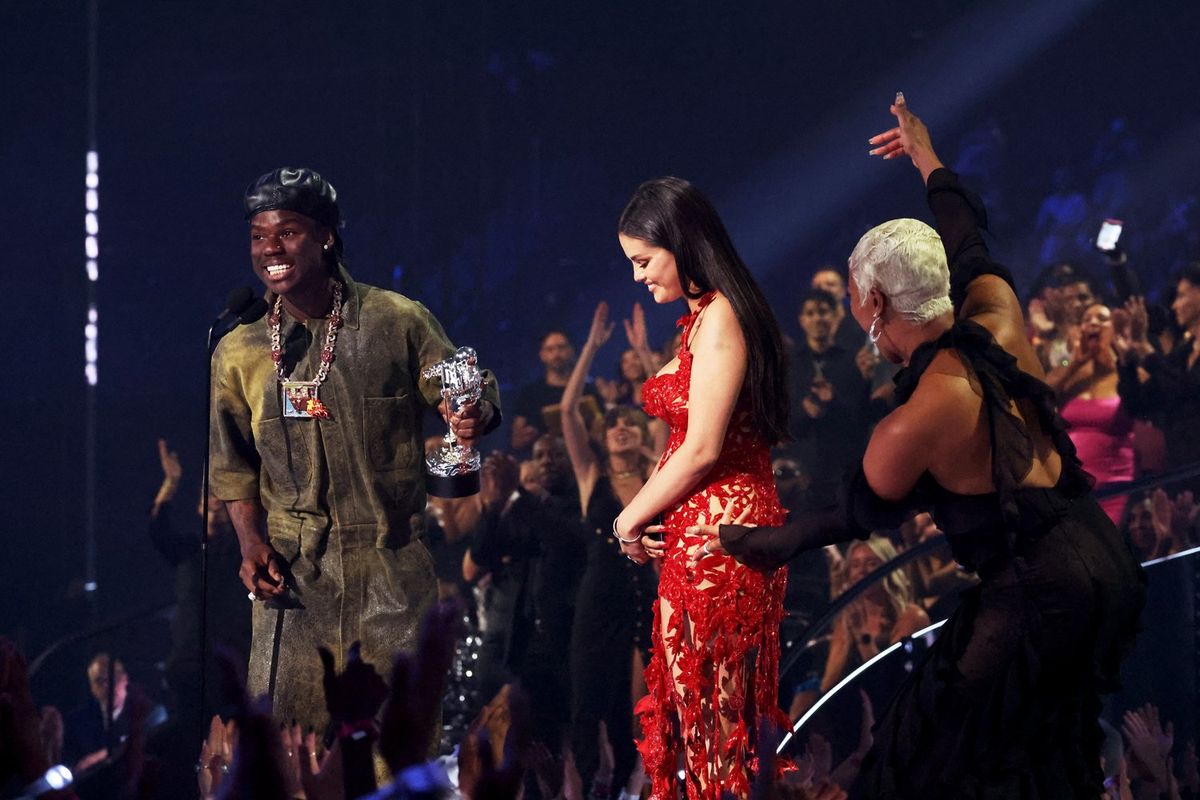 Rema and Selena Gomez accept the Best Afrobeats award for "Calm Down" from Tiffany Haddish onstage during the 2023 MTV Video Music Awards at Prudential Center on September 12, 2023 in Newark, New Jersey.