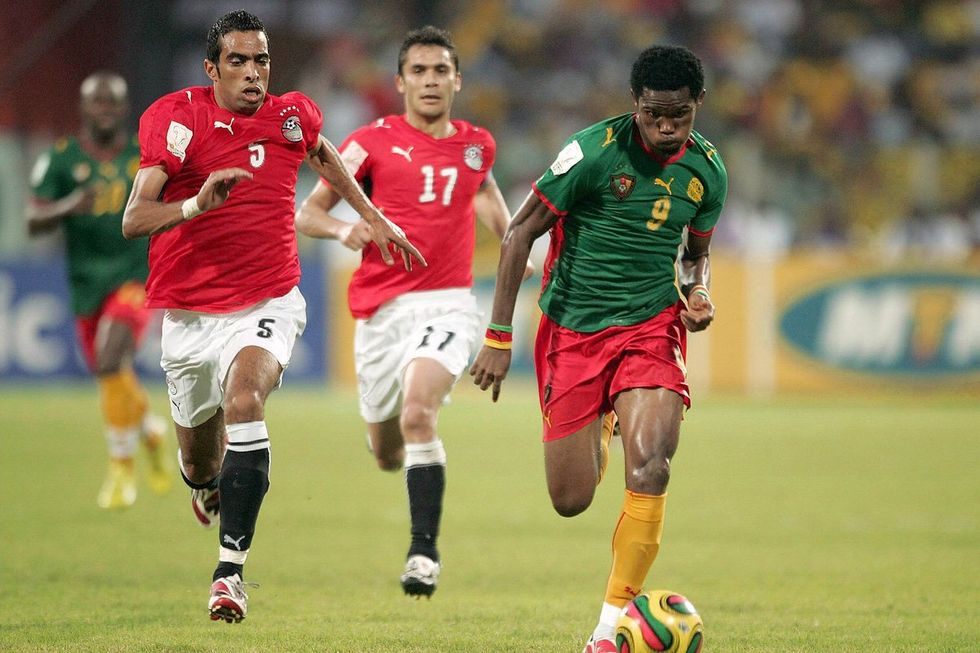 Shady Fattah Mohamed and Ahmed Hasan Kamel of Egypt run after and Samel Eto'o of Cameroon during the AFCON match final between Cameroon and Egypt held at the Ohene Djan Stadium on February 10, 2008 in Accra, Ghana.