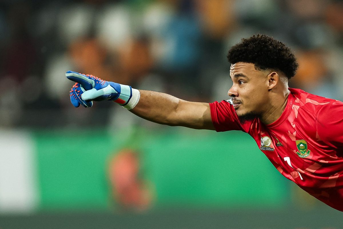 South Africa's goalkeeper #1 Ronwen Williams celebrates after winning at the end of the Africa Cup of Nations (CAN) 2024 quarter-final football match between Cape Verde and South Africa at the Stade Charles Konan Banny in Yamoussoukro on February 3, 2024.