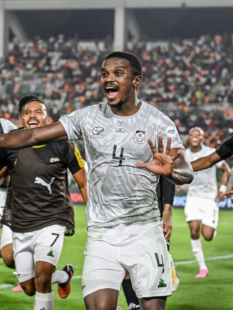 South Africa's midfielder #4 Teboho Mokoena (C) celebrates with teammates after scoring a goal during the Africa Cup of Nations (CAN) 2024 round of 16 football match between Morocco and South Africa at the Stade Laurent Pokou in San Pedro on January 30, 2024. 