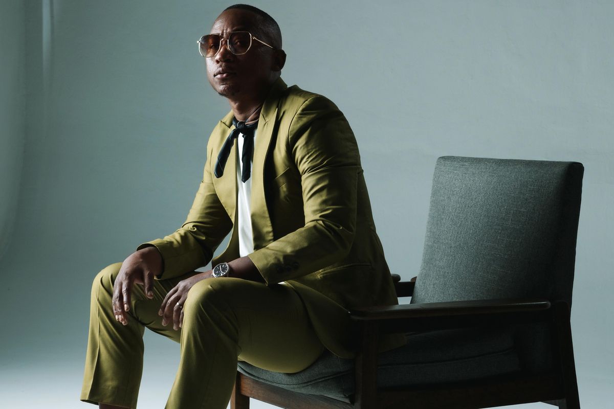 South African rapper Khuli Chana stylishly rocking a lime suit