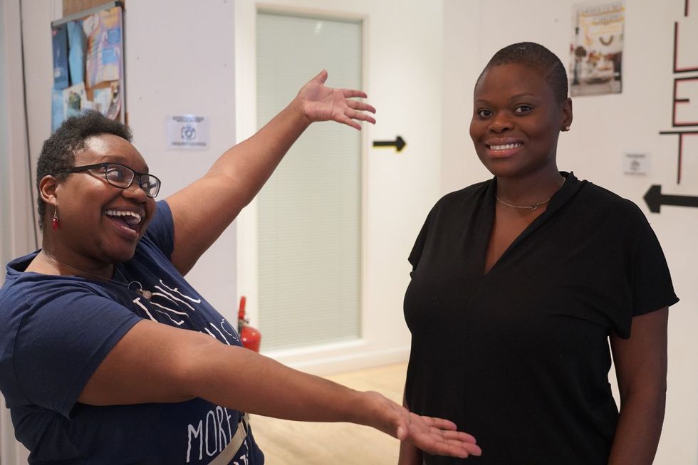 Stephanie Chisom Ozuo poses for a photo with a participant at a careers workshop.
