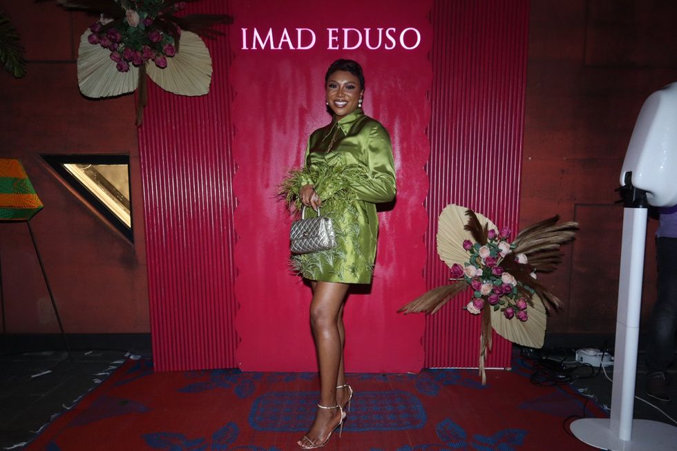 Stephanie Coker posing in an Imad Eduso piece from the new collection showcased during an intimate, private dinner at Lagos Fashion Week
