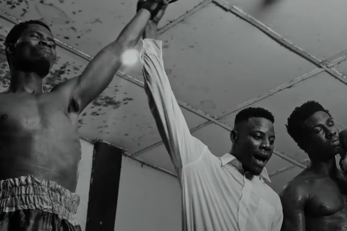 Still shot from Kwesi Arthur’s “Pain Interlude” music video.