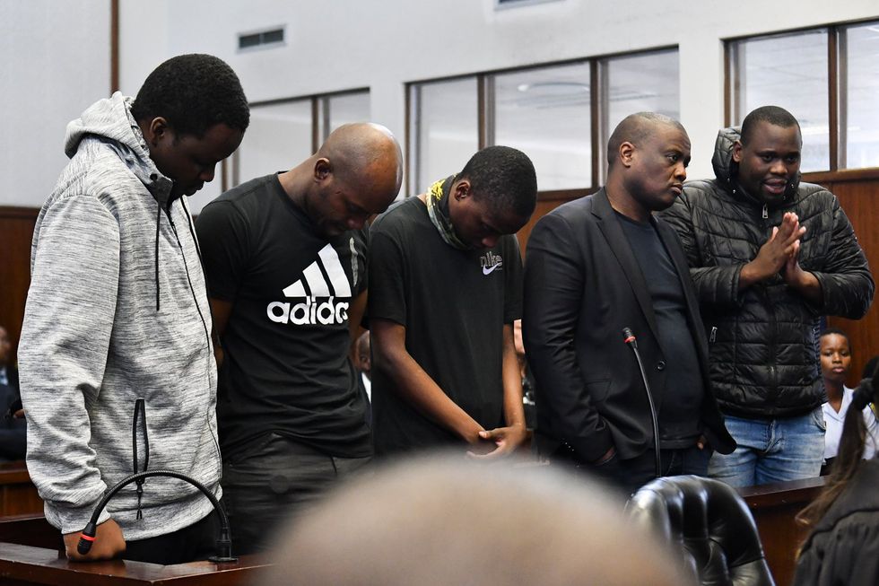 Suspects in the murder of rapper AKA are asked to remove masks during the AKA murder case at Durban Magistrate's Court on February 29, 2024 in Durban, South Africa.