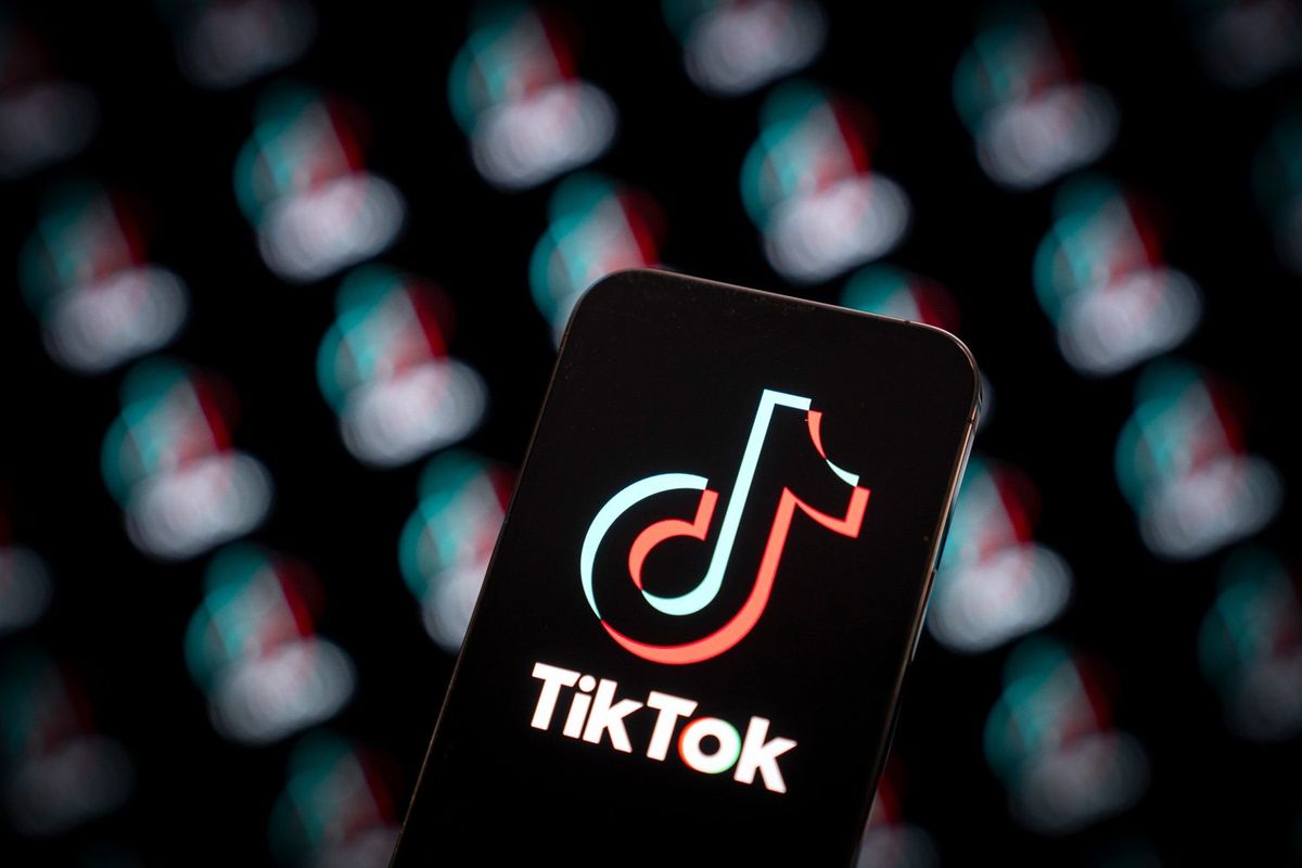 ​The TikTok logo is seen on a mobile device in this illustration photo in Warsaw, Poland on 14 July, 2023.
