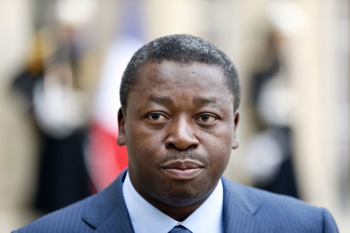 Togolese President Faure Gnassingbe (L) speaks to jounralists after a meeting with the French president at the Elysee Palace in Paris on November 15, 2013.