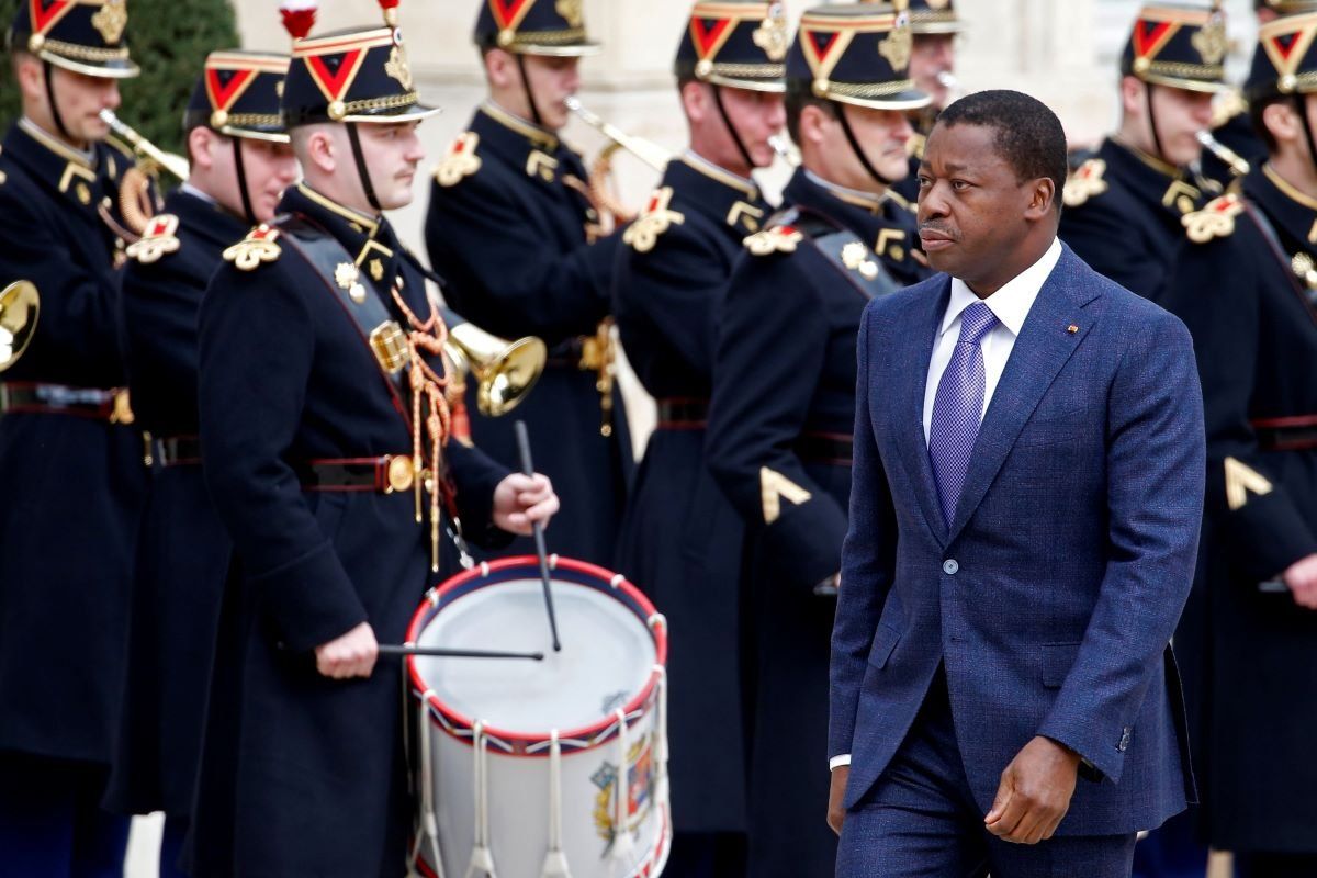 Togolese President Faure Gnassingbé walks past the honor guard prior to his working lunch with French President Emmanuel Macron at the Elysee Presidential Palace on April 09, 2021 in Paris, France.