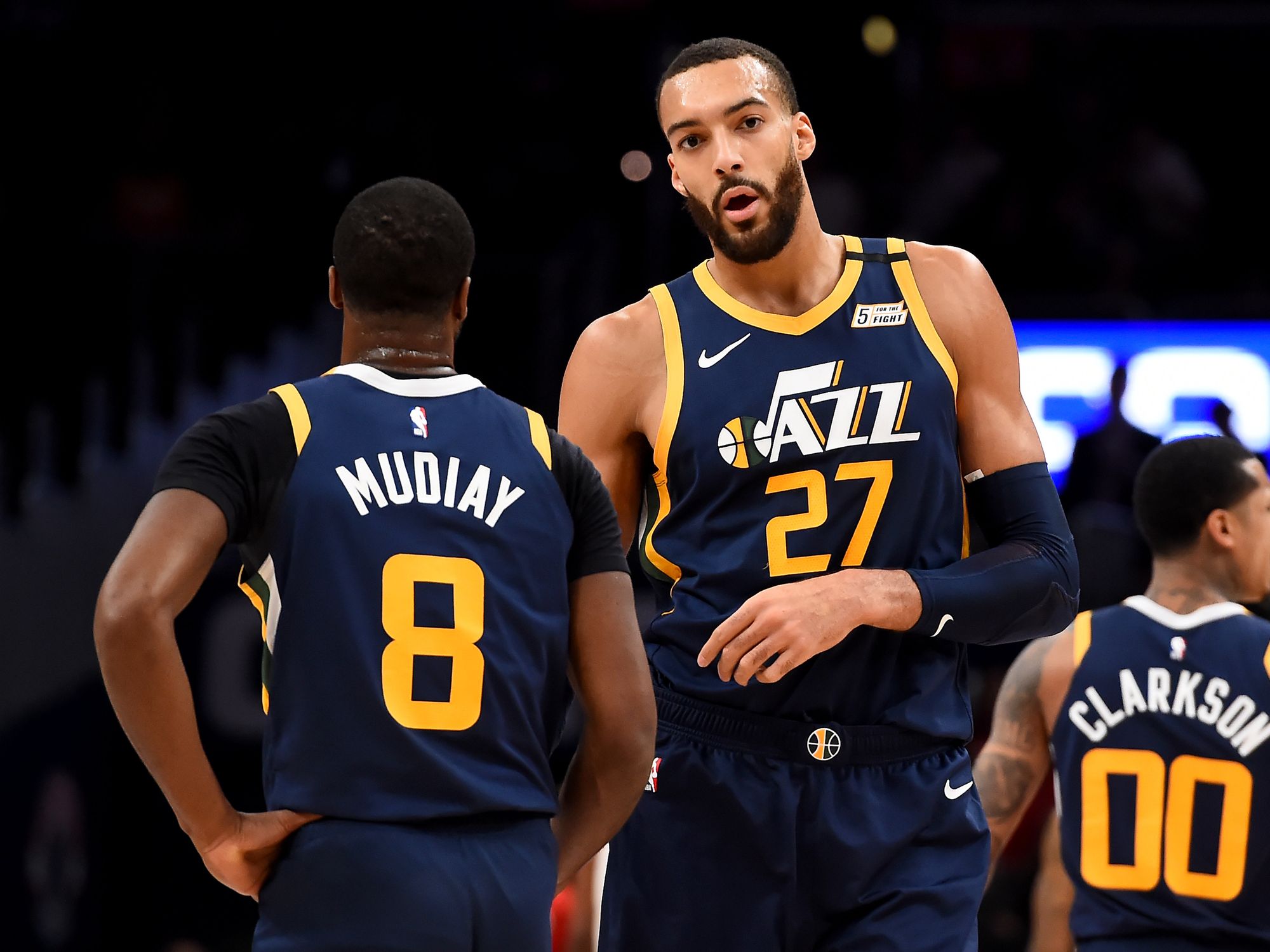 WASHINGTON, DC - JANUARY 12: Rudy Gobert #27 and Emmanuel Mudiay #8 of the Utah Jazz speak during the game against the Washington Wizards at Capital One Arena on January 12, 2020 in Washington, DC.