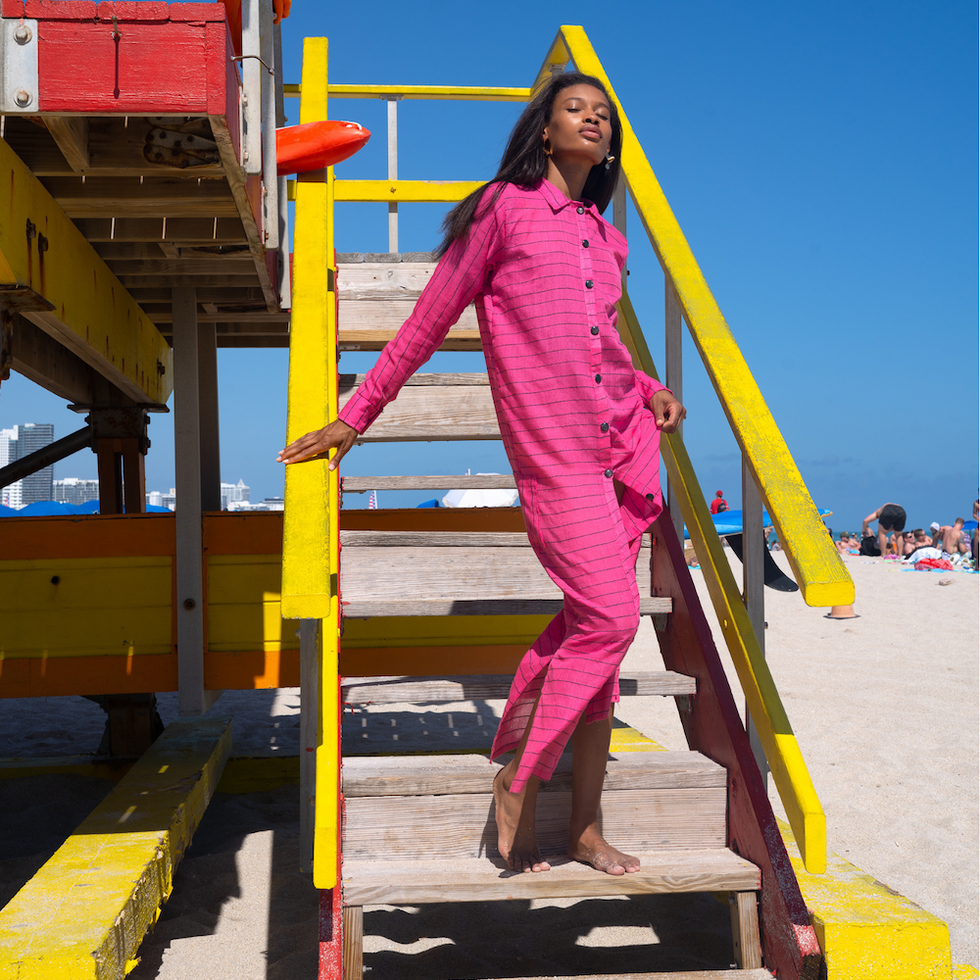 woman in pink at the beach