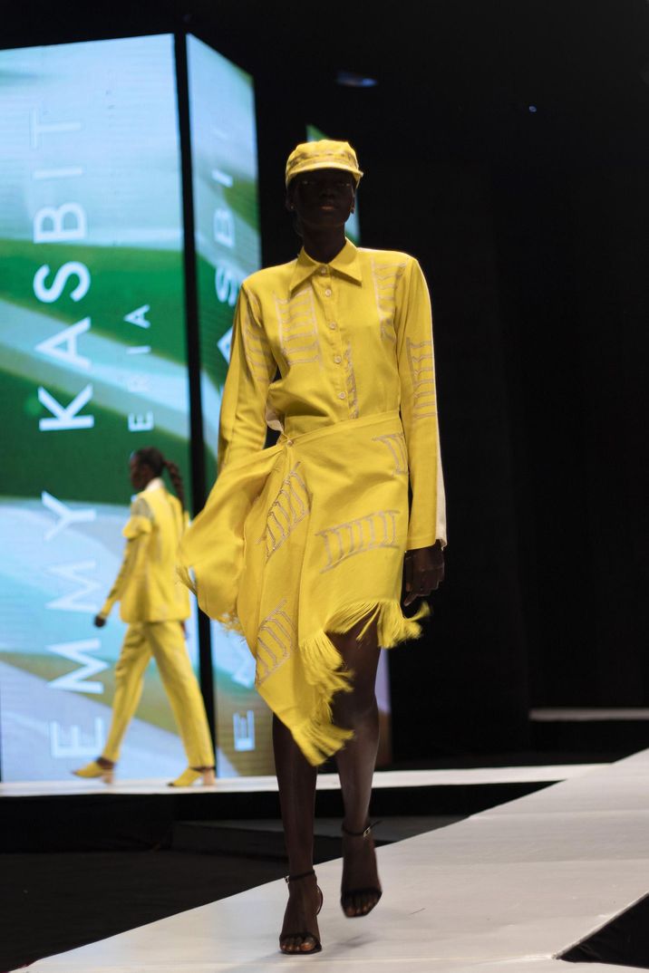 woman wearing yellow dress during Emmy Kasbit class=