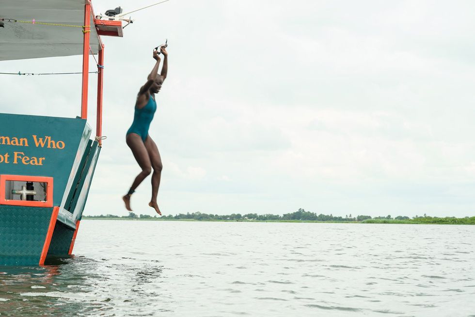 Yvette Tetteh leaps off "The Woman Who Does Not Fear" into the Volta River.